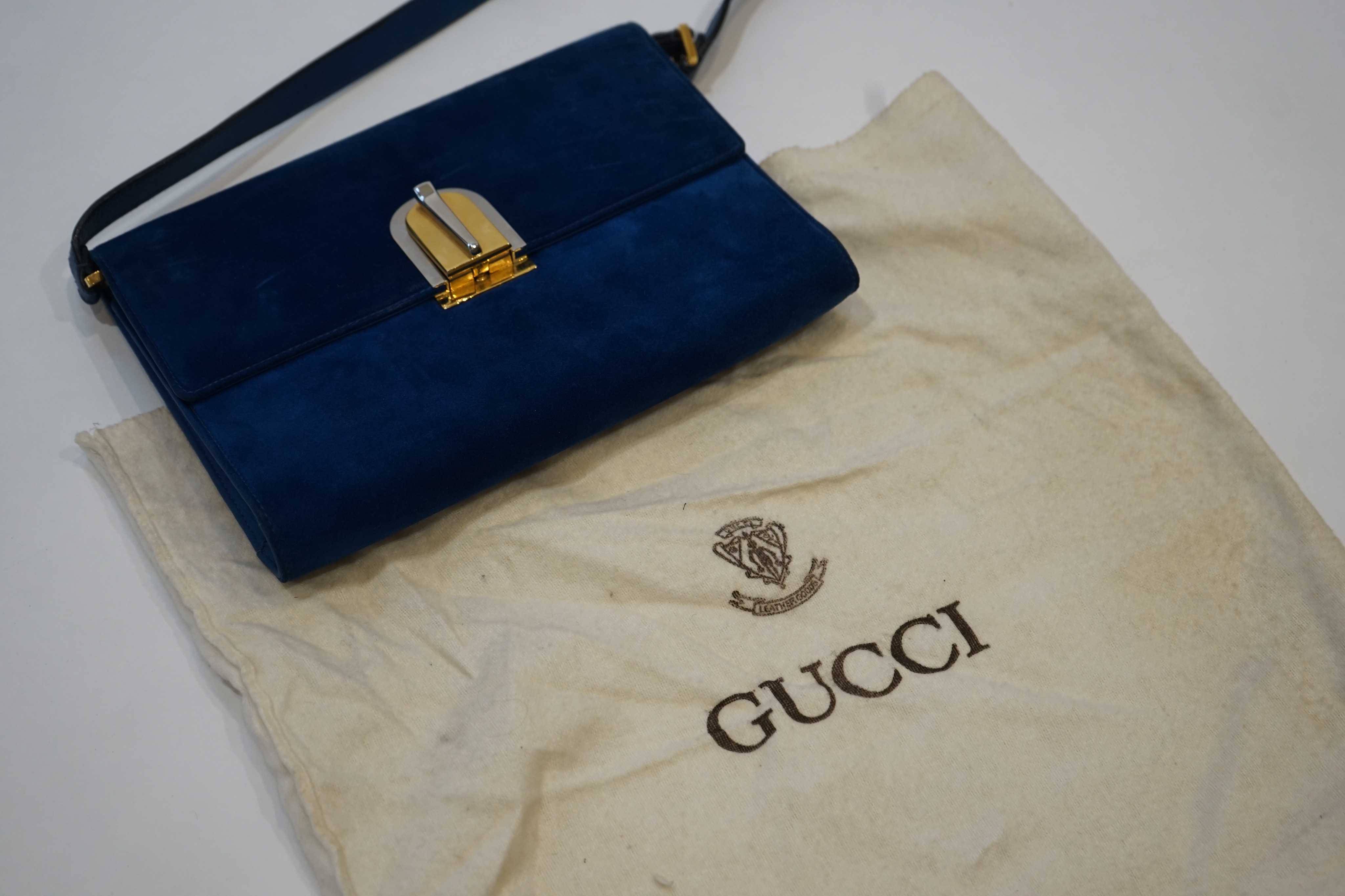 A vintage Gucci Boutique blue suede handbag 22cm.